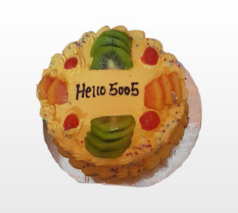 Butterscotch cake (with cherry and fruits on top)